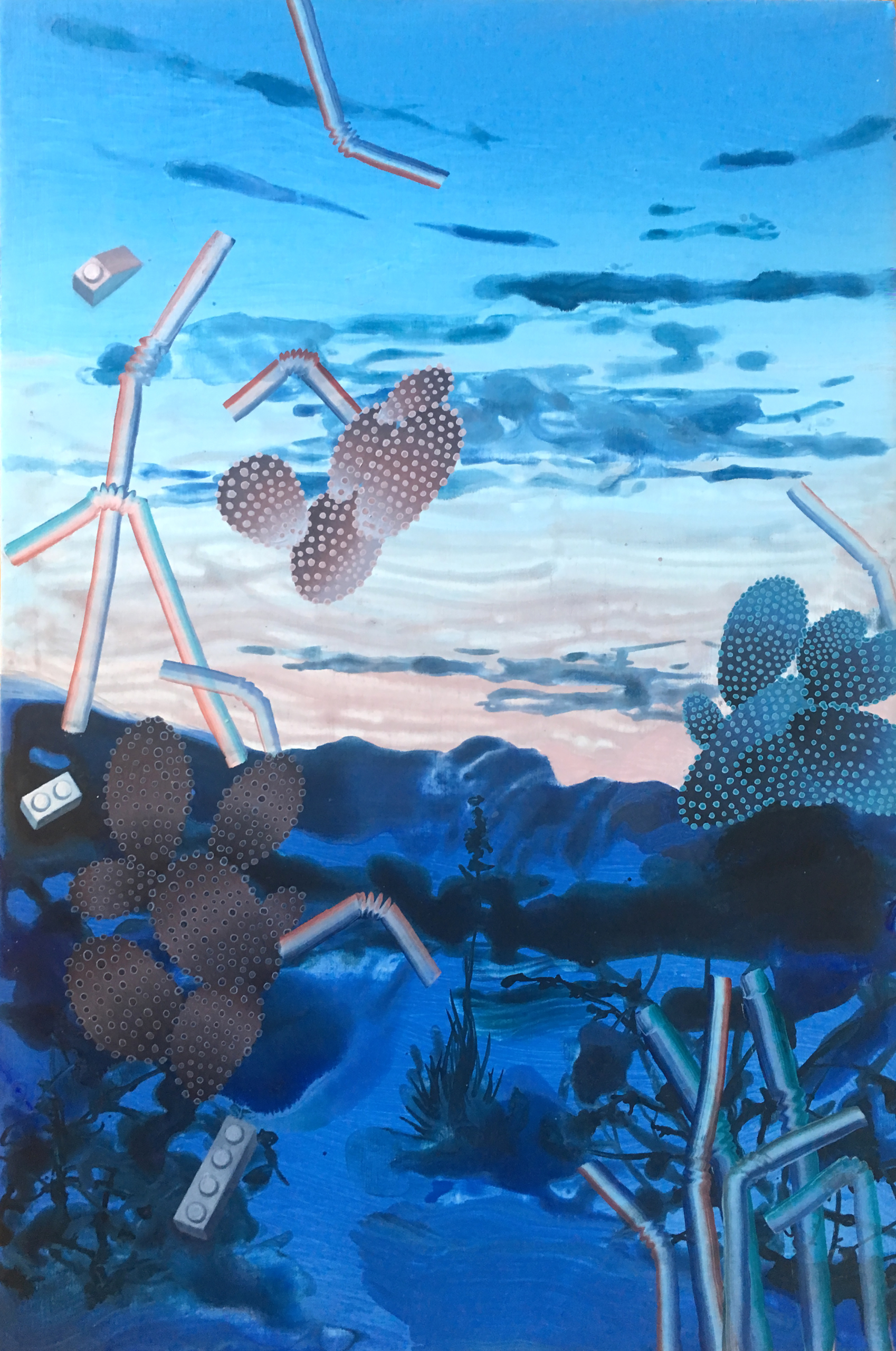 a blue landscape with LEGO blocks and bendy straws scattered about